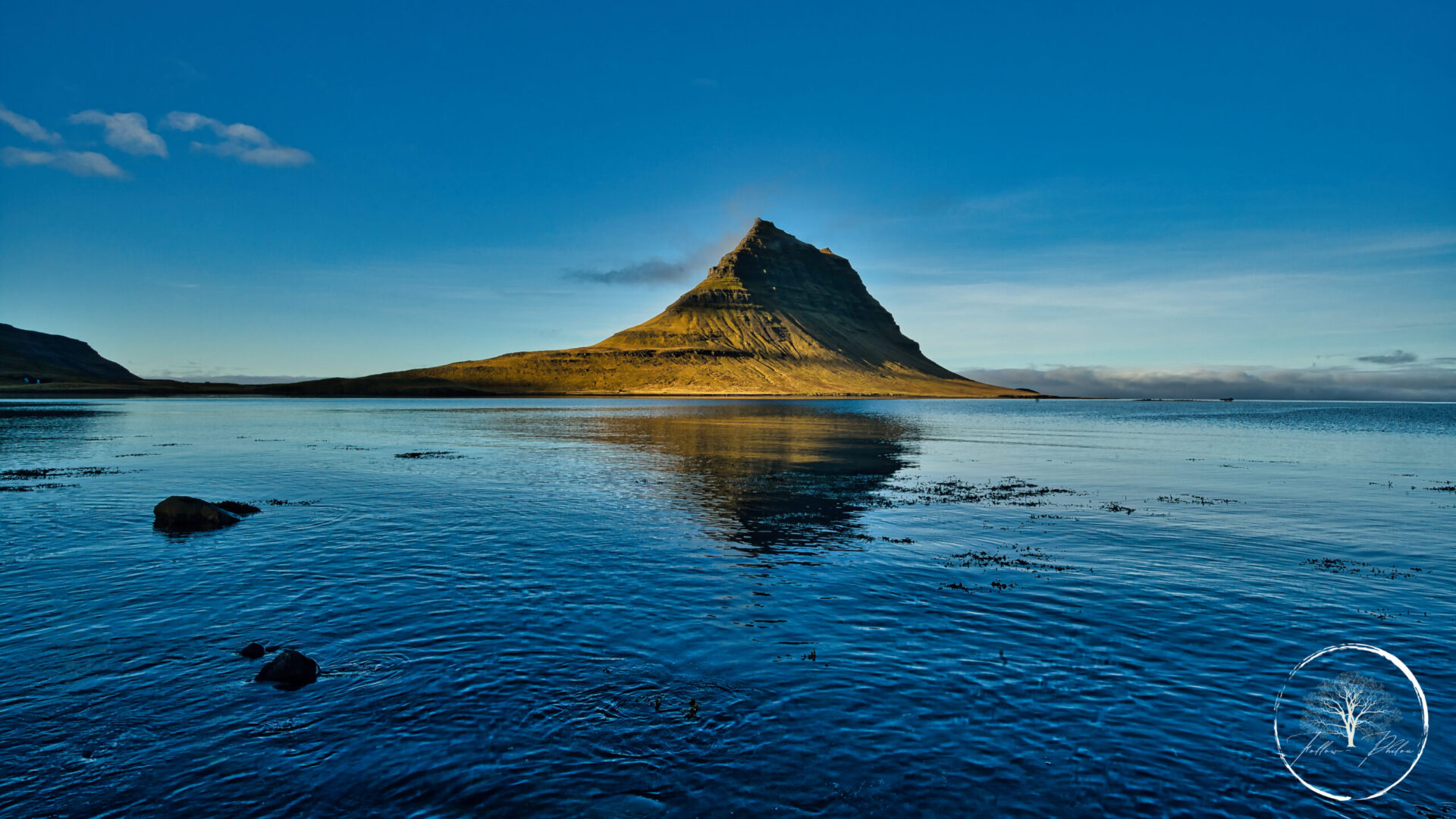 Kirkjufell mountain reflected in the sea, Iceland